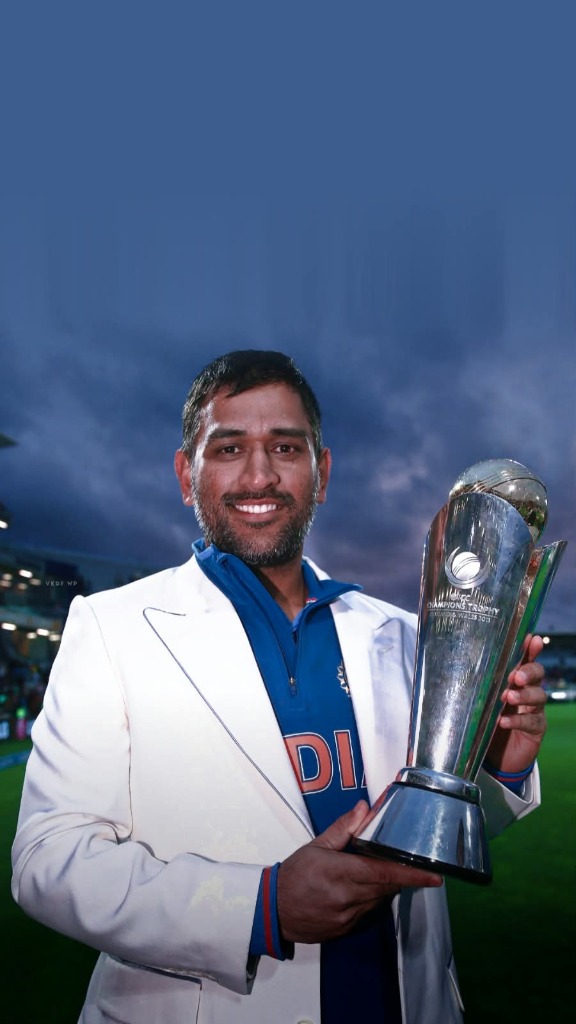 MS Dhoni with ICC Champions Trophy 2013 in white blazer at Edgbaston