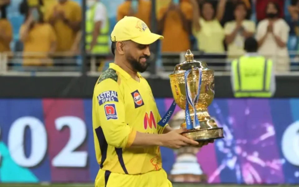 MS Dhoni holding the 2021 IPL Trophy in Dubai with CSK